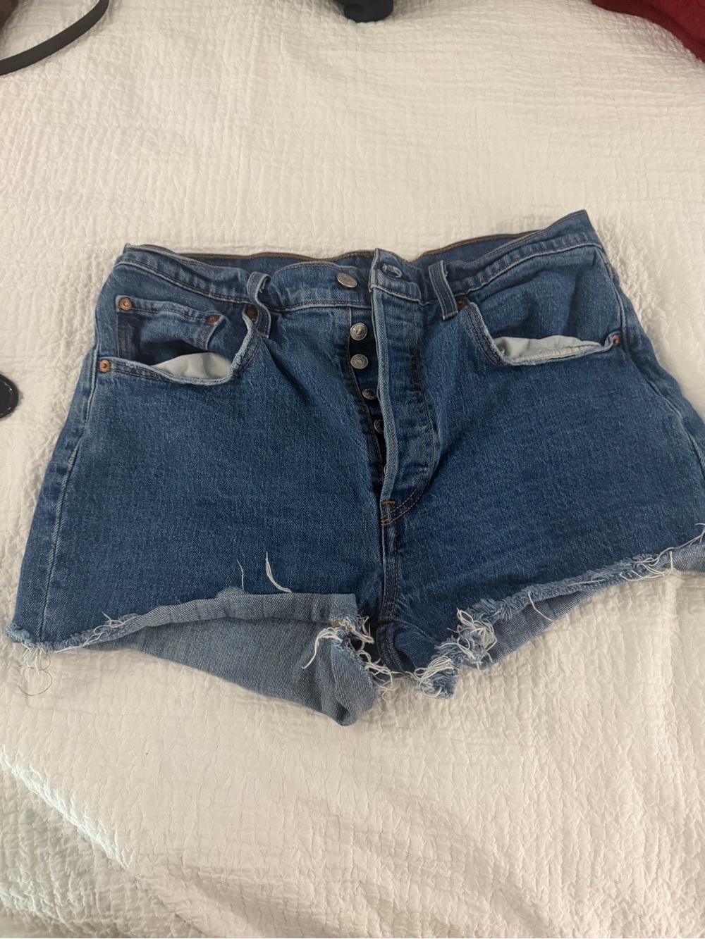 Levi's Raw Hem Dark Blue Denim Cutoff Shorts